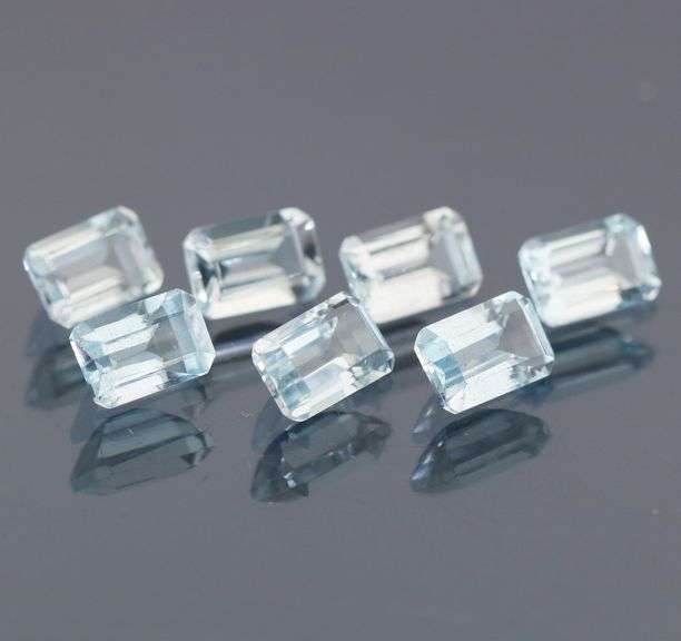 Gorgeous 5.29ct platinum blue emerald cut Topaz set