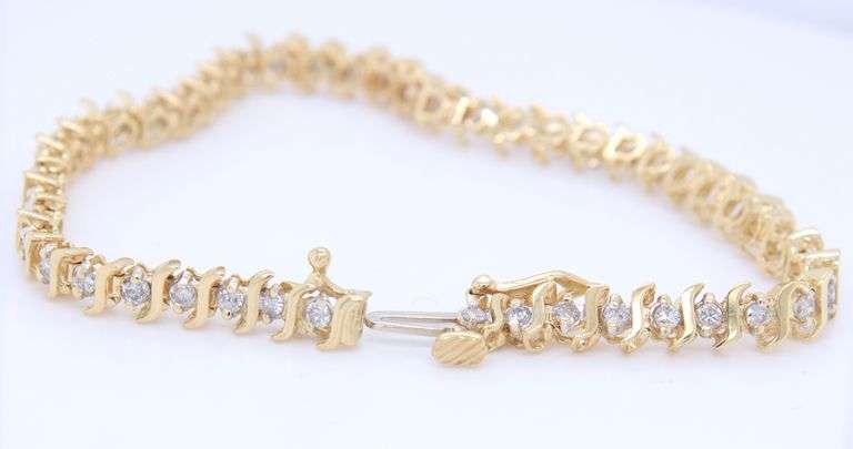 Elegant Yellow Gold 1.50ctw Diamond S Tennis Bracelet