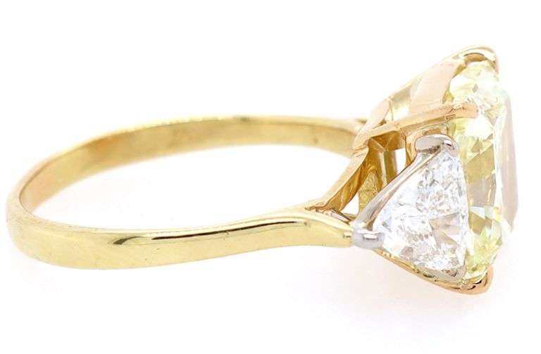 GIA Certified 4.02ct Fancy Light Yellow Internally Flawless Radiant Diamond and 1.50ctw White Trillion Diamond Three Stone Engagement Ring in 18K
