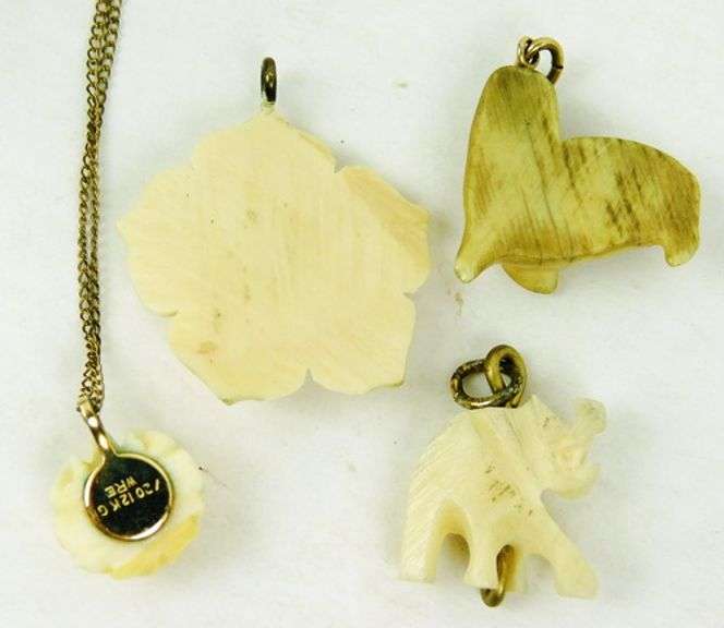 4 Vintage Carved Bone Pendants