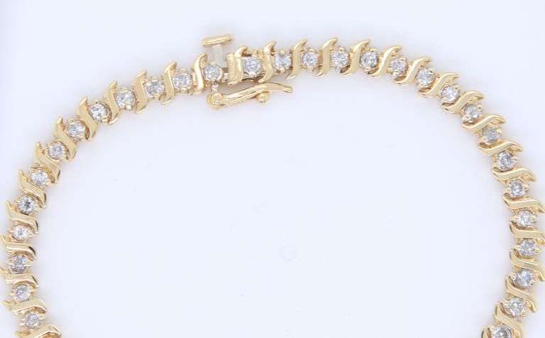 Elegant Yellow Gold 1.50ctw Diamond S Tennis Bracelet
