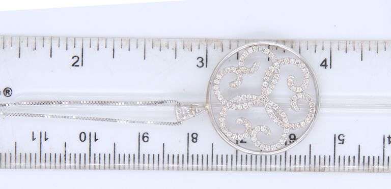 Sparkling White Gold Diamond Swirl Pendant on Chain