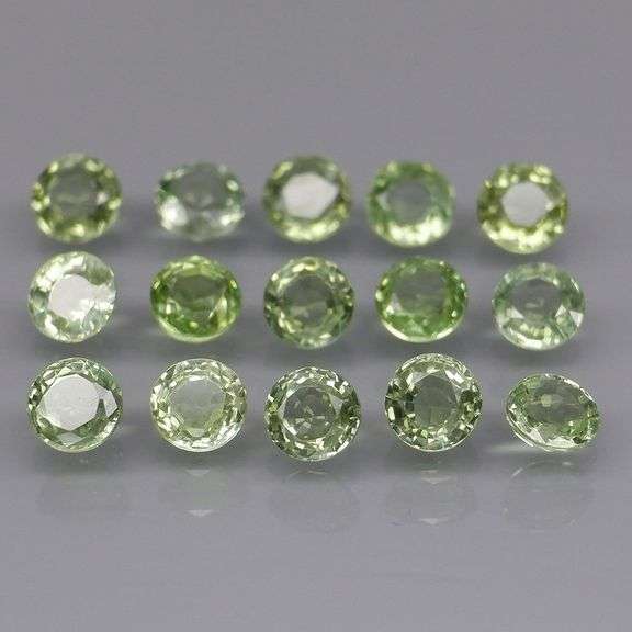Fantastic 3.05ct round cut GREEN Sapphire set