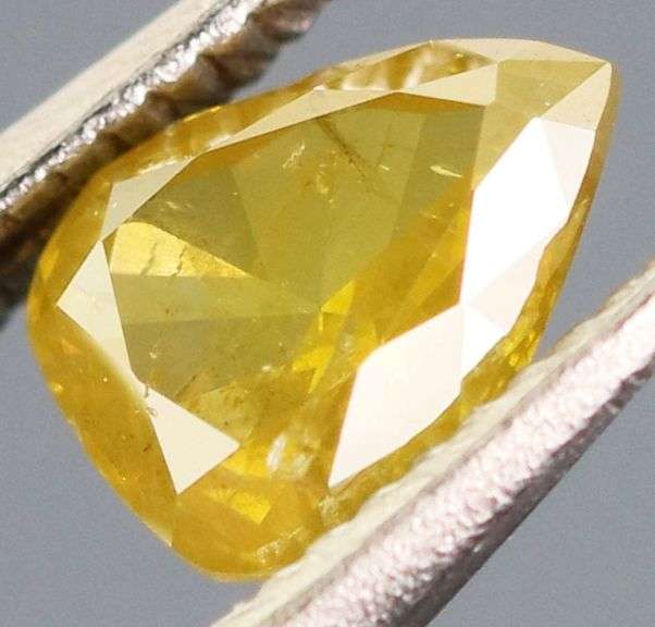 Excellent .33ct pear cut yellow Diamond