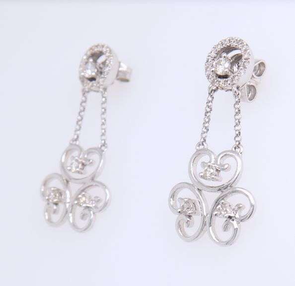 Sparkling White Gold Diamond Swirl Dangle Earrings