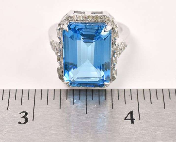 Jaw Dropping 14.60CTS Blue Topaz &. 0.52CTW Diamond Ring in Sterling Silver