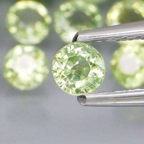 Fantastic 6.15ct diamond cut GREEN Sapphire set