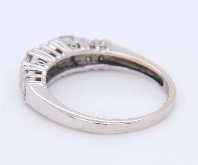 Dazzling White Gold Round Brilliant and Baguette Cut Diamond Band