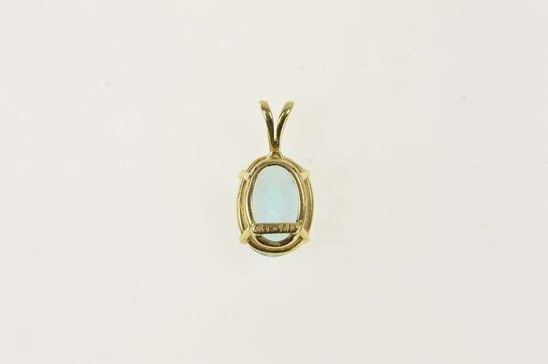 14K Yellow Gold Oval Blue Topaz Solitaire Classic Pendant