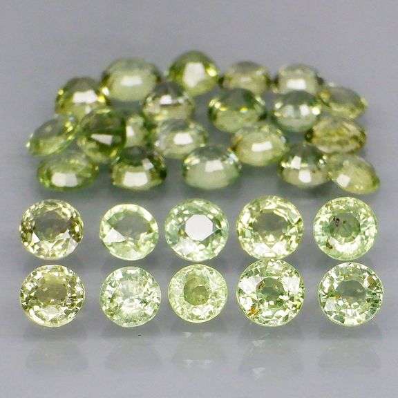 Fantastic 6.15ct diamond cut GREEN Sapphire set