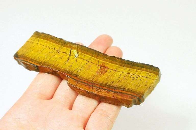 Mezmerizing 303ct rough cut Tiger Eye
