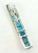 10K Pendant of Princess Cut Blue Topaz Stones