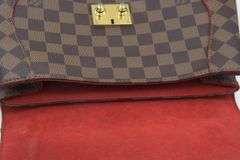 Louis Vuitton Caissa Clutch Damier