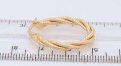 Gorgeous Yellow Gold Oval Twisted Hoop Earrings
