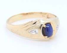 Gent's Yellow Gold oval Star Sapphire and Diamond Ring