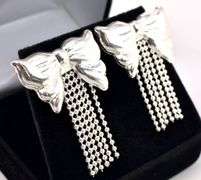 Pretty Bow Stud Earrings In Sterling Silver