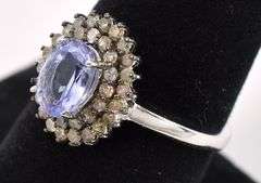 Elegant 1.2CTS Oval Cut Tanzanite & 0.60CTW Diamond Ring in Sterling Silver
