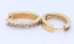 Brilliant Yellow Gold 0.60ctw Channel Set oval Diamond Hoops