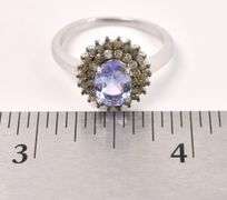 Elegant 1.2CTS Oval Cut Tanzanite & 0.60CTW Diamond Ring in Sterling Silver