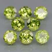 Dazzling 4.56ct top apple green Peridot set