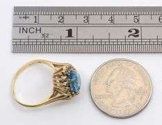 Pear Sha[ed Blue Topaz Ring with Diamonds
