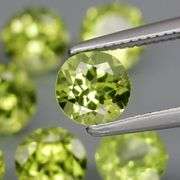Dazzling 4.56ct top apple green Peridot set