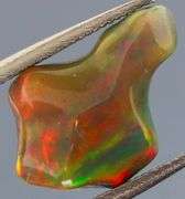 High fire collectors 2.21ct free form black Opal vein