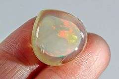 One of a kind! 12.90ct untreated reverse Opal!