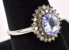 Elegant 1.2CTS Oval Cut Tanzanite & 0.60CTW Diamond Ring in Sterling Silver