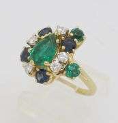 Emerald, Sapphire, and Diamond Cocktail ring in 18k Yellow Gold