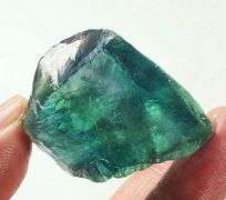 Glowing 158ct natural rough Flourite