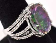 Marvelous 7.70CTS Mystic Quartz &. 0.83CTW White Topaz Ring in Sterling Silver