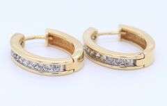 Brilliant Yellow Gold 0.60ctw Channel Set oval Diamond Hoops