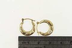 14K Yellow Gold 14.6mm Textured Puffy Twist Fashion Hoop Earrings