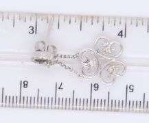 Sparkling White Gold Diamond Swirl Dangle Earrings