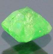 Glittering .48ct top kelly green Tsavorite Garnet