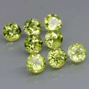 Dazzling 4.56ct top apple green Peridot set