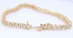 Elegant Yellow Gold 1.50ctw Diamond S Tennis Bracelet