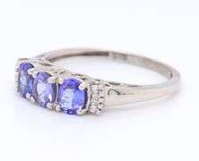 Gorgeous White Gold Oval Tanzanite and Baguette Three Stone Ring