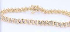 Elegant Yellow Gold 1.50ctw Diamond S Tennis Bracelet