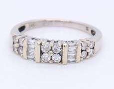 Dazzling White Gold Round Brilliant and Baguette Cut Diamond Band