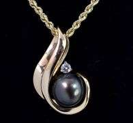 Endearing Pearl and Diamond Pendant Necklace In 14K Yellow Gold
