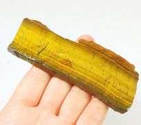 Mezmerizing 303ct rough cut Tiger Eye