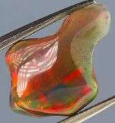 High fire collectors 2.21ct free form black Opal vein