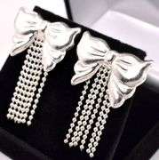 Pretty Bow Stud Earrings In Sterling Silver