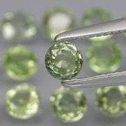 Fantastic 3.05ct round cut GREEN Sapphire set