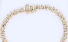 Elegant Yellow Gold 1.50ctw Diamond S Tennis Bracelet