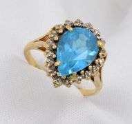Pear Sha[ed Blue Topaz Ring with Diamonds