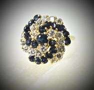 Mesmerizing 14K Sapphire and Diamond Swirl Ring
