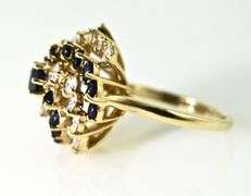 Mesmerizing 14K Sapphire and Diamond Swirl Ring